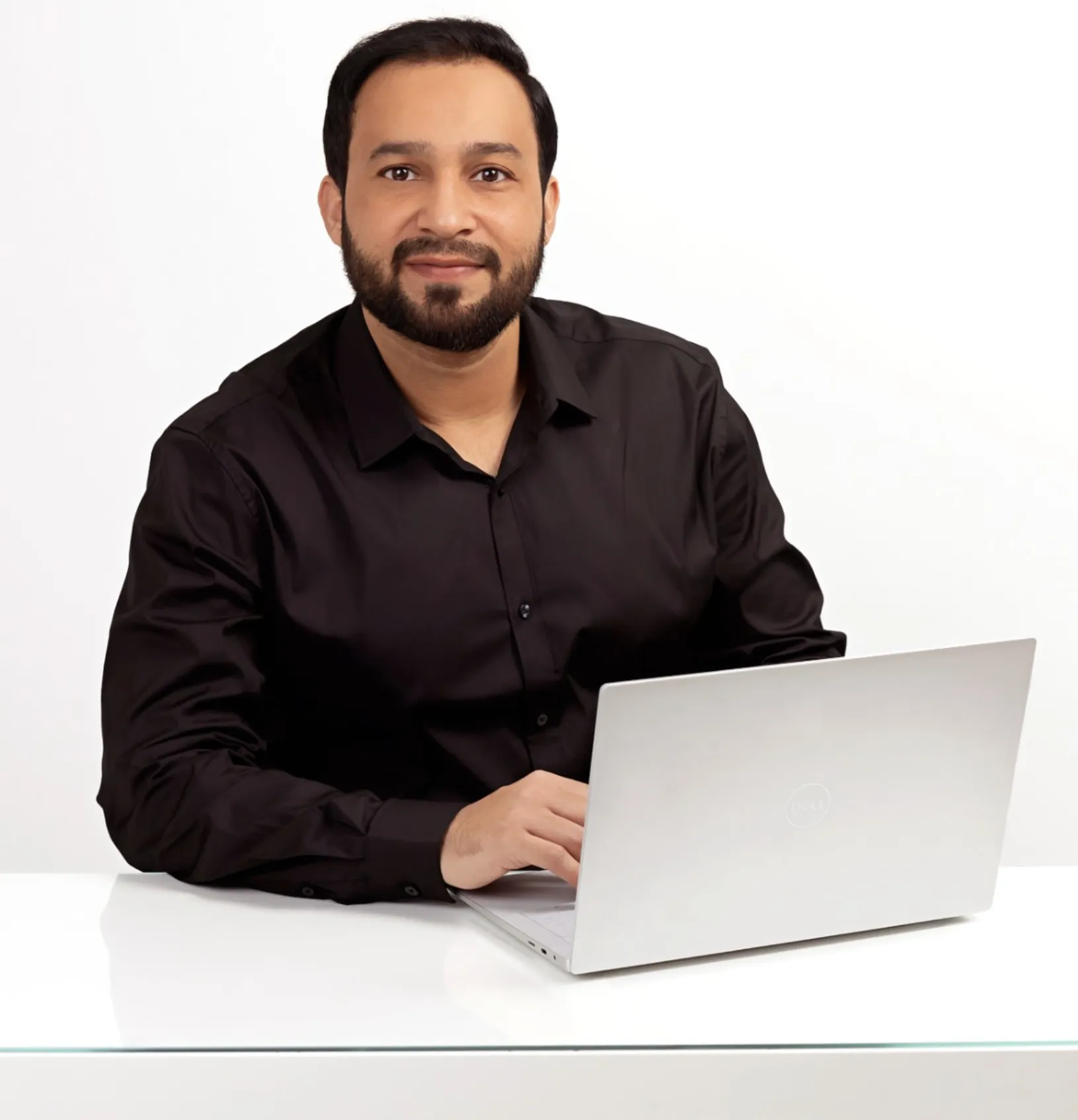 Arsalan Yasin at his laptop